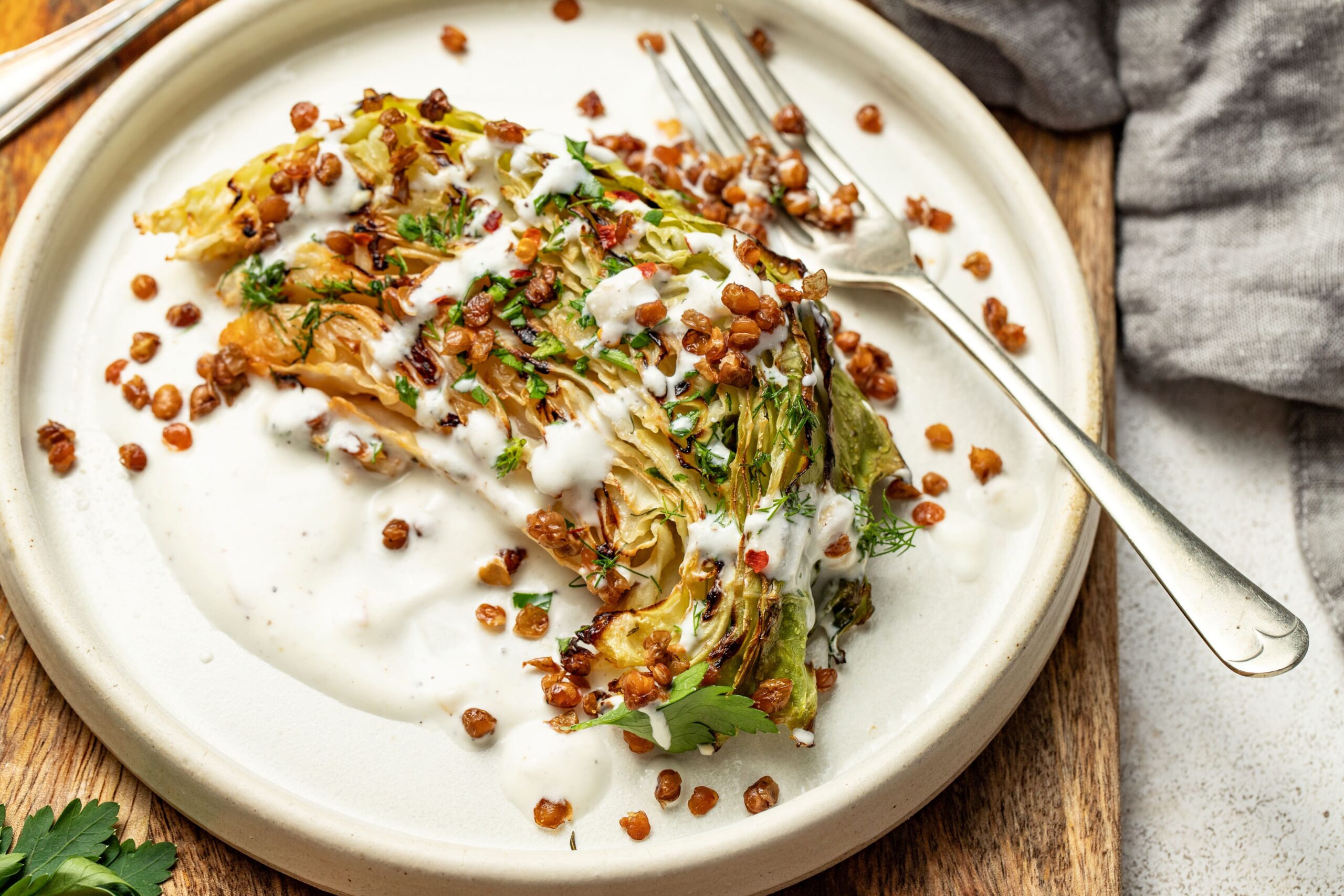 Grilled Cabbage Wedges with Crispy Lentils & Creamy Lemon Sauce - Alberta Pulse Growers