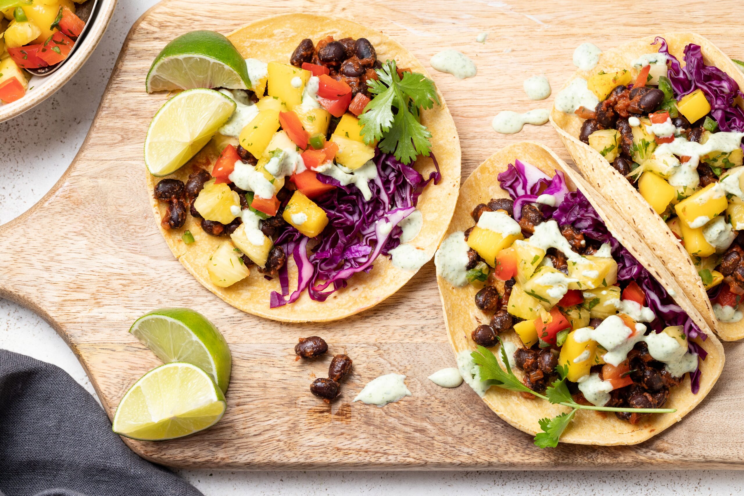 Black Bean Tacos with Tropical Salsa & Cilantro-Lime Crema